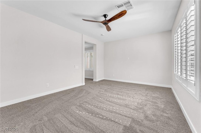 10345 Howling Coyote Ave, Las Vegas, NV 89135 - spare room featuring a ceiling fan, carpet floors, and baseboards