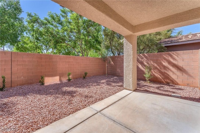 10345 Howling Coyote Ave, Las Vegas, NV 89135 - view of patio / terrace with a fenced backyard