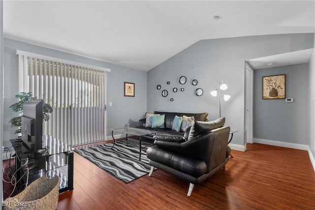 231 W Horizon Ridge Parkway Unit 1228, Henderson, NV 89012 - living area with wood finished floors, vaulted ceiling, and baseboards