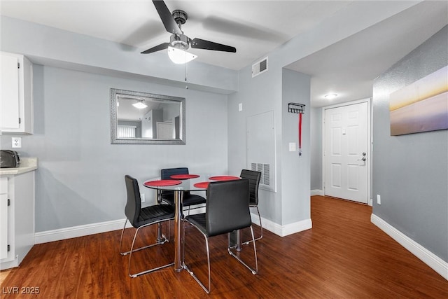 231 W Horizon Ridge Parkway Unit 1228, Henderson, NV 89012 - dining room featuring wood finished floors, ceiling fan, and baseboards