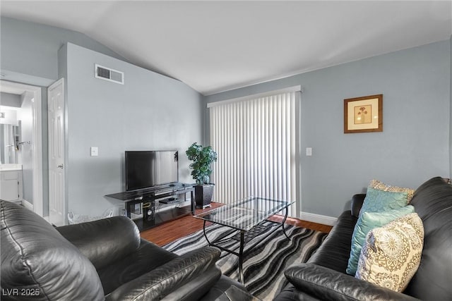231 W Horizon Ridge Parkway Unit 1228, Henderson, NV 89012 - living area with wood finished floors, vaulted ceiling, and baseboards