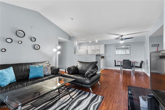 231 W Horizon Ridge Parkway Unit 1228, Henderson, NV 89012 - living room featuring a ceiling fan, wood finished floors, lofted ceiling, and baseboards