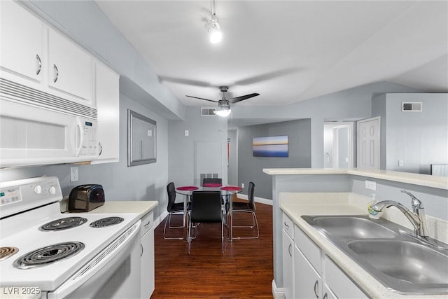 231 W Horizon Ridge Parkway Unit 1228, Henderson, NV 89012 - kitchen featuring white appliances, a sink, dark wood-style floors, light countertops, and white cabinetry