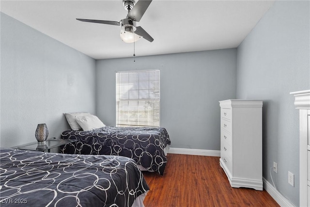 231 W Horizon Ridge Parkway Unit 1228, Henderson, NV 89012 - bedroom with wood finished floors, baseboards, and ceiling fan