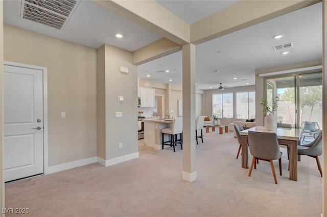 9903 Spinel Pl, Las Vegas, NV 89143 - dining area with light carpet, baseboards, recessed lighting, and a ceiling fan