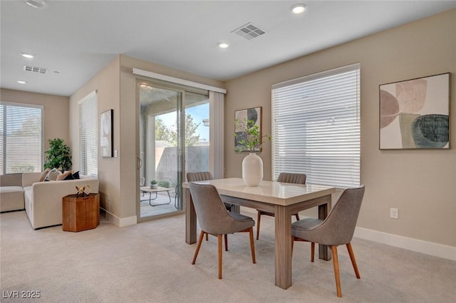 9903 Spinel Pl, Las Vegas, NV 89143 - dining space with light colored carpet, baseboards, and recessed lighting