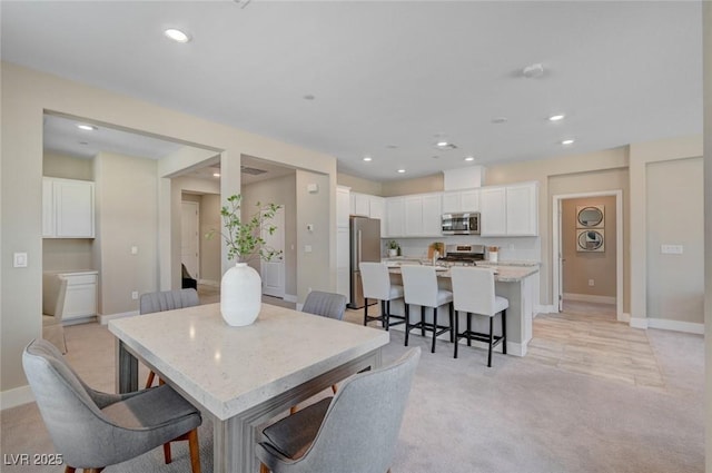 9903 Spinel Pl, Las Vegas, NV 89143 - dining area with recessed lighting, baseboards, and light carpet