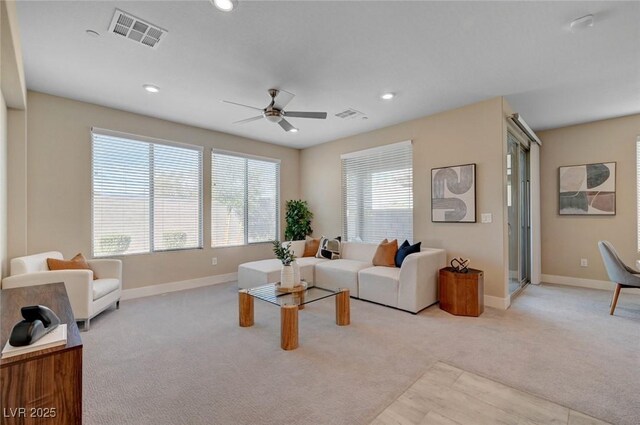 9903 Spinel Pl, Las Vegas, NV 89143 - living room featuring light colored carpet, ceiling fan, baseboards, and recessed lighting