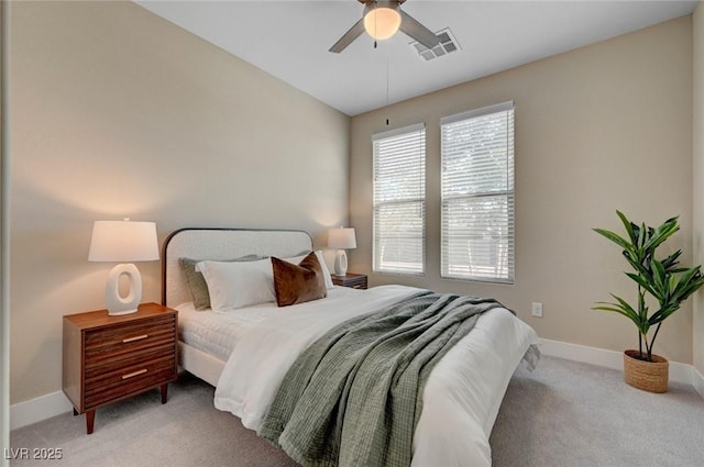 9903 Spinel Pl, Las Vegas, NV 89143 - bedroom with light carpet, baseboards, and ceiling fan