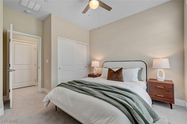 9903 Spinel Pl, Las Vegas, NV 89143 - bedroom featuring light colored carpet, baseboards, a closet, and a ceiling fan