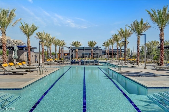 9903 Spinel Pl, Las Vegas, NV 89143 - community pool featuring a patio area