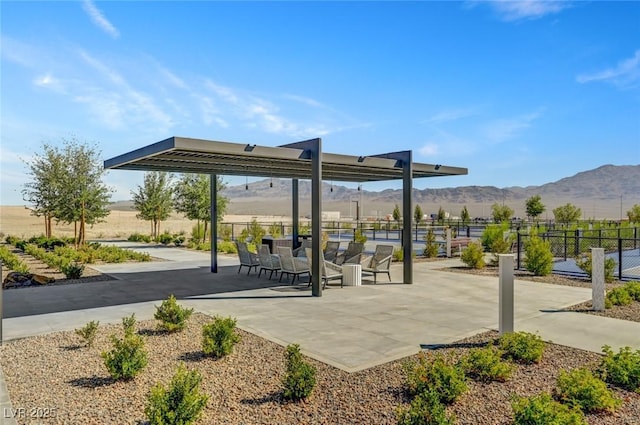 9903 Spinel Pl, Las Vegas, NV 89143 - view of home's community featuring a mountain view and a patio