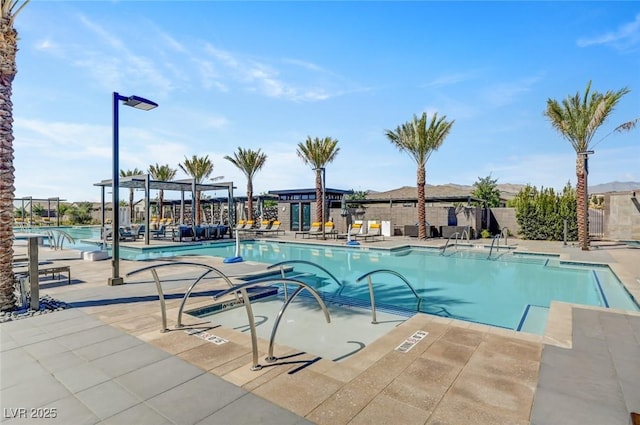 9903 Spinel Pl, Las Vegas, NV 89143 - community pool featuring a pergola and a patio