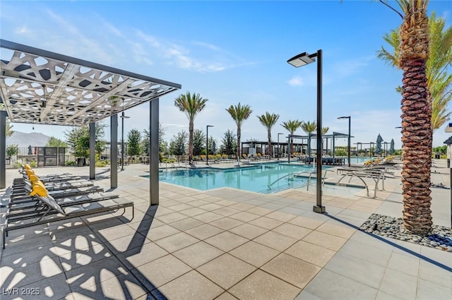 9903 Spinel Pl, Las Vegas, NV 89143 - community pool featuring a patio