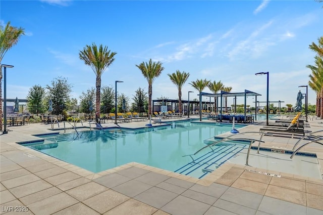 9903 Spinel Pl, Las Vegas, NV 89143 - community pool with a patio