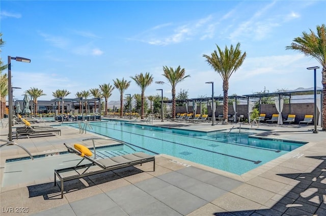 9903 Spinel Pl, Las Vegas, NV 89143 - community pool featuring a patio