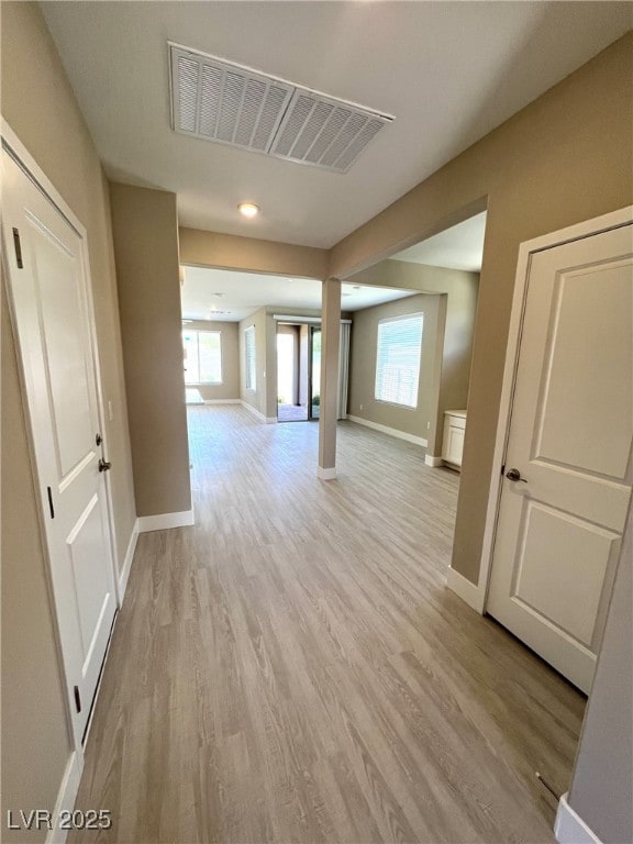9903 Spinel Pl, Las Vegas, NV 89143 - corridor featuring baseboards and light wood-type flooring