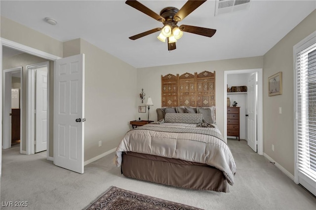 9046 Barium Rock Ave, Las Vegas, NV 89143 - bedroom with light colored carpet, baseboards, and ceiling fan