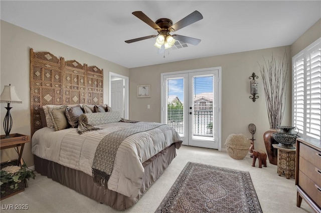 9046 Barium Rock Ave, Las Vegas, NV 89143 - bedroom with light carpet, access to exterior, and multiple windows