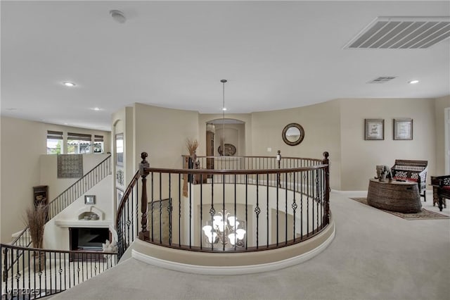 9046 Barium Rock Ave, Las Vegas, NV 89143 - hall featuring an upstairs landing, carpet floors, and recessed lighting