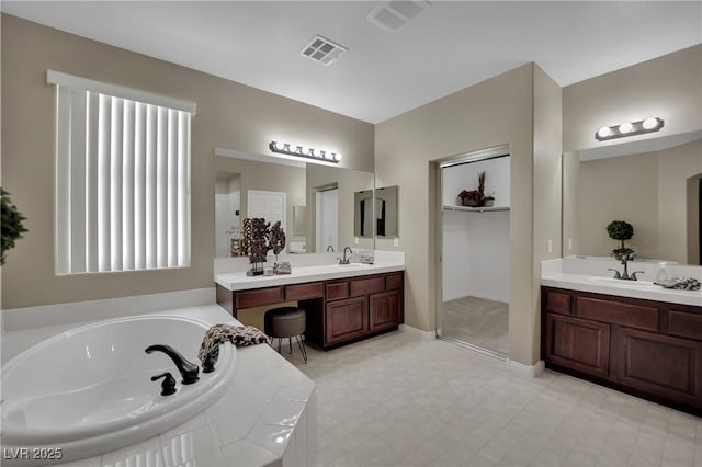 9046 Barium Rock Ave, Las Vegas, NV 89143 - full bath with a garden tub and two vanities