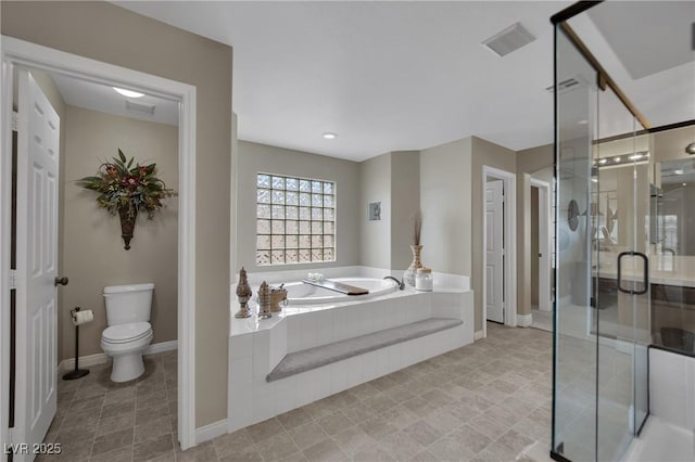9046 Barium Rock Ave, Las Vegas, NV 89143 - full bathroom with a shower stall, a bath, toilet, and baseboards