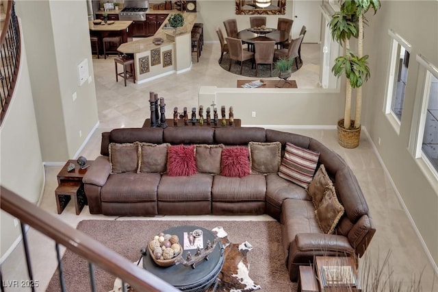9046 Barium Rock Ave, Las Vegas, NV 89143 - living area with baseboards and stairway