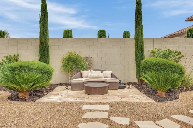 9046 Barium Rock Ave, Las Vegas, NV 89143 - view of patio / terrace with fence and an outdoor hangout area
