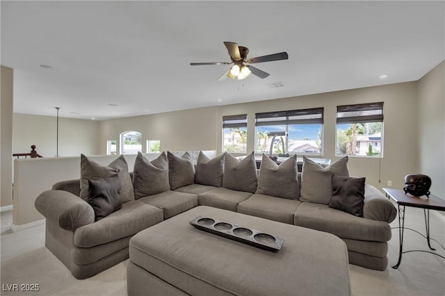 9046 Barium Rock Ave, Las Vegas, NV 89143 - living room featuring ceiling fan, healthy amount of natural light, light carpet, and recessed lighting