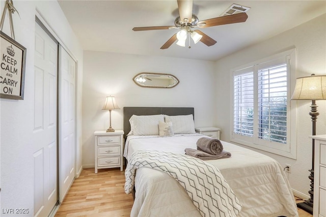 6021 Winter Meadow St, Las Vegas, NV 89130 - bedroom featuring light wood-style flooring, a closet, a ceiling fan, and baseboards