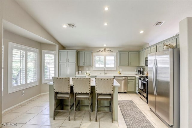 6021 Winter Meadow St, Las Vegas, NV 89130 - kitchen featuring appliances with stainless steel finishes, a sink, light countertops, a center island, and recessed lighting