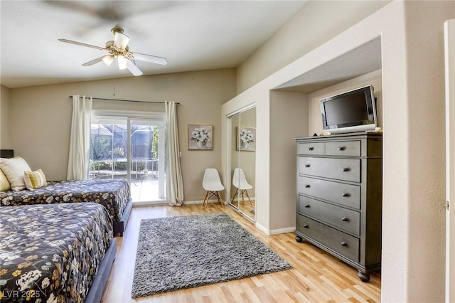 6021 Winter Meadow St, Las Vegas, NV 89130 - bedroom featuring access to outside, light wood-style floors, baseboards, ceiling fan, and vaulted ceiling