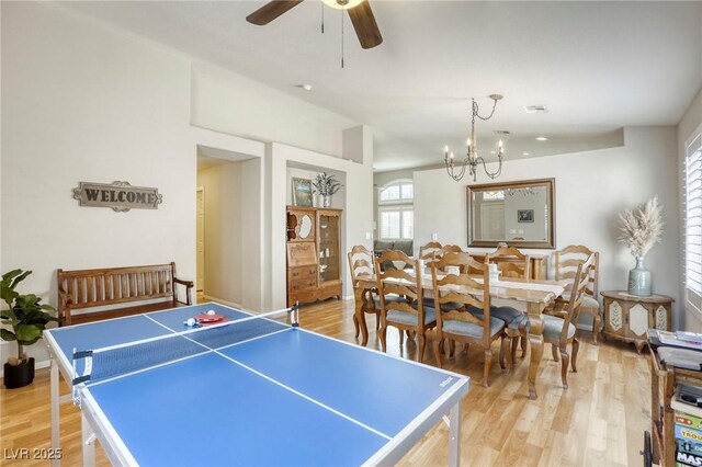 6021 Winter Meadow St, Las Vegas, NV 89130 - playroom featuring light wood finished floors, a chandelier, and ceiling fan