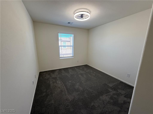 1906 Arietta Vista St, Henderson, NV 89044 - unfurnished room featuring dark carpet and baseboards