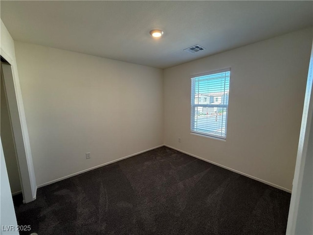 1906 Arietta Vista St, Henderson, NV 89044 - unfurnished room featuring dark carpet and baseboards