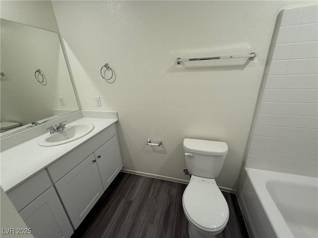 1906 Arietta Vista St, Henderson, NV 89044 - full bath with toilet, vanity, wood finished floors, and baseboards