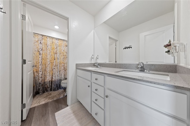2729 Pavehawk Way, Las Vegas, NV 89156 - full bathroom with double vanity, wood finished floors, and a shower with curtain