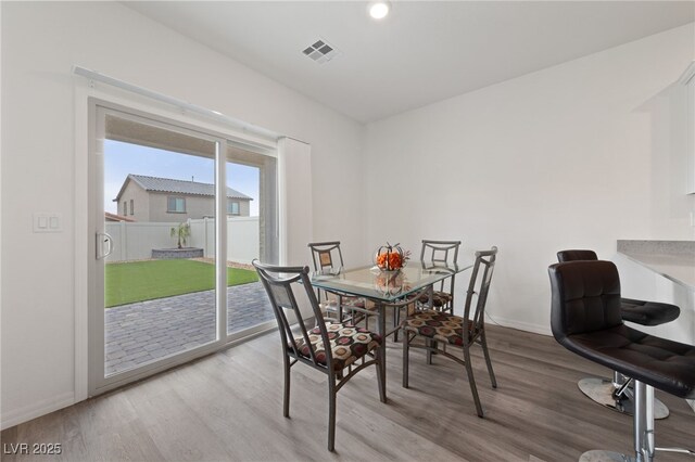 2729 Pavehawk Way, Las Vegas, NV 89156 - dining area featuring wood finished floors and baseboards
