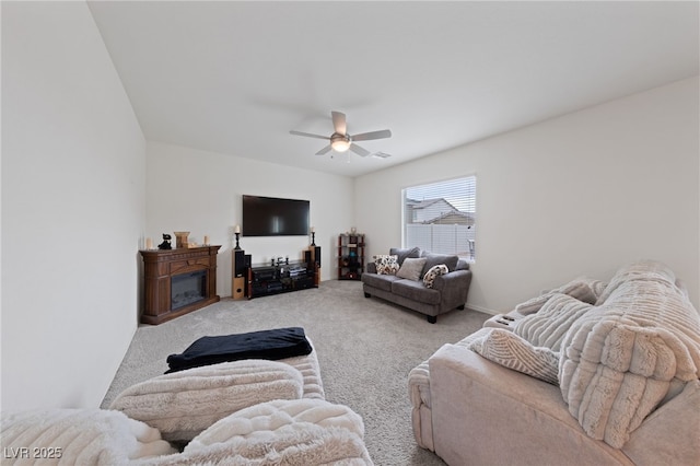 2729 Pavehawk Way, Las Vegas, NV 89156 - living area featuring light colored carpet, ceiling fan, and a glass covered fireplace