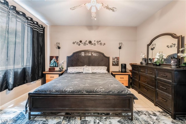 10701 Windrose Point Ave, Las Vegas, NV 89144 - bedroom featuring light tile patterned flooring and a ceiling fan