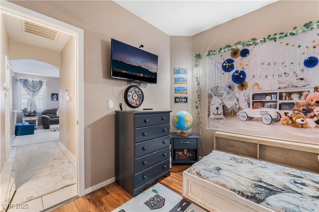 10701 Windrose Point Ave, Las Vegas, NV 89144 - bedroom with wood finished floors and baseboards