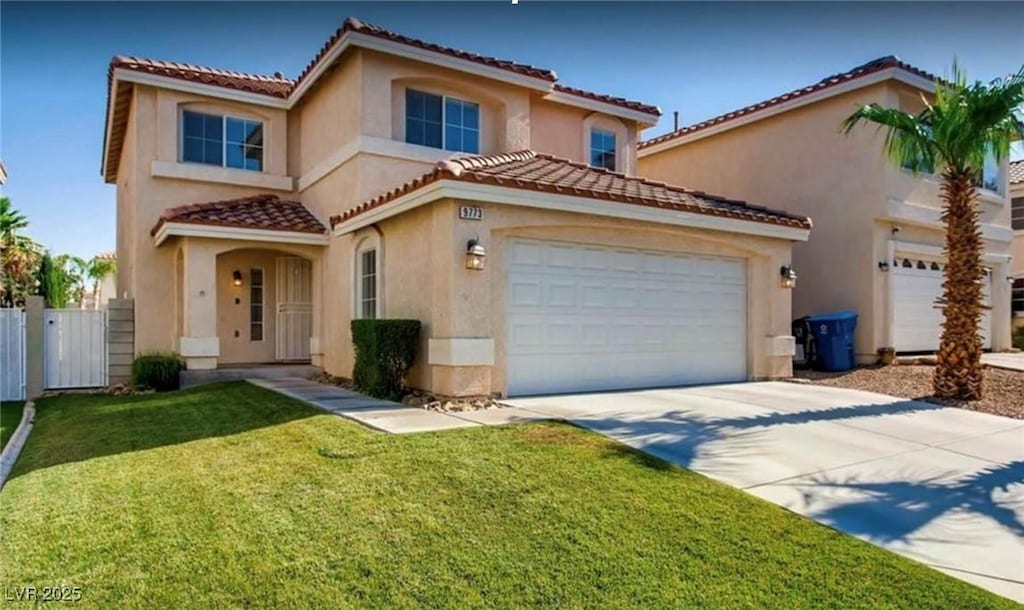9773 Sonora Bend Ave, Las Vegas, NV 89148 - mediterranean / spanish house featuring concrete driveway, a tile roof, stucco siding, an attached garage, and a gate