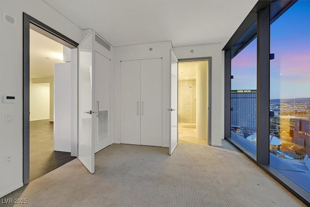 3726 Las Vegas Blvd Unit 1902, Las Vegas, NV 89158 - unfurnished bedroom featuring carpet and a closet