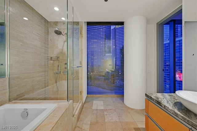 3726 Las Vegas Blvd Unit 1902, Las Vegas, NV 89158 - full bathroom featuring a shower stall, vanity, a bath, and recessed lighting