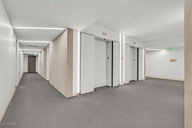 3726 Las Vegas Blvd Unit 1902, Las Vegas, NV 89158 - corridor with carpet floors, baseboards, and elevator