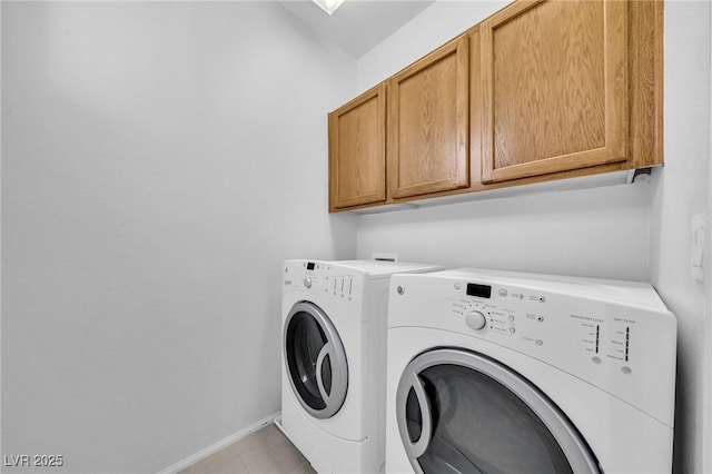 2432 Granada Bluff Ct, Las Vegas, NV 89135 - laundry room with cabinet space, independent washer and dryer, and baseboards