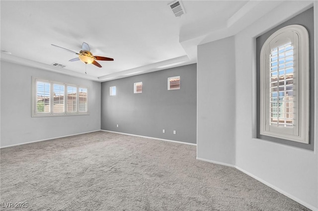 2432 Granada Bluff Ct, Las Vegas, NV 89135 - carpeted empty room featuring a ceiling fan, baseboards, and a raised ceiling