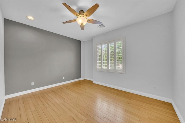 2432 Granada Bluff Ct, Las Vegas, NV 89135 - spare room with ceiling fan, baseboards, wood finished floors, and recessed lighting