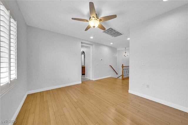 2432 Granada Bluff Ct, Las Vegas, NV 89135 - spare room with light wood-style floors, a ceiling fan, baseboards, and recessed lighting
