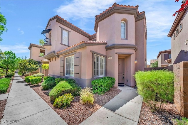 2432 Granada Bluff Ct, Las Vegas, NV 89135 - mediterranean / spanish-style home featuring a tile roof and stucco siding